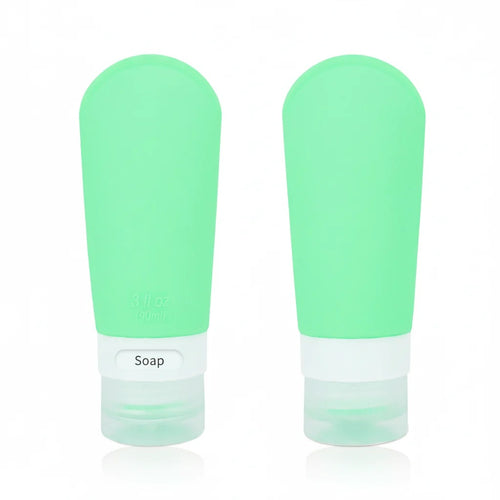 2-Pack Mint Green Flexible Silicone Leakproof Travel Squeeze Bottles with Clear Label Base and Flip-Top Caps on white background