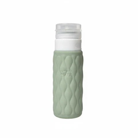 Sage Green Diamond-Textured Silicone Travel Squeeze Bottle with White Leakproof Pump Cap on white background